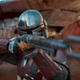 Mando brandishing a weapon that is most definitely not a tuning fork.